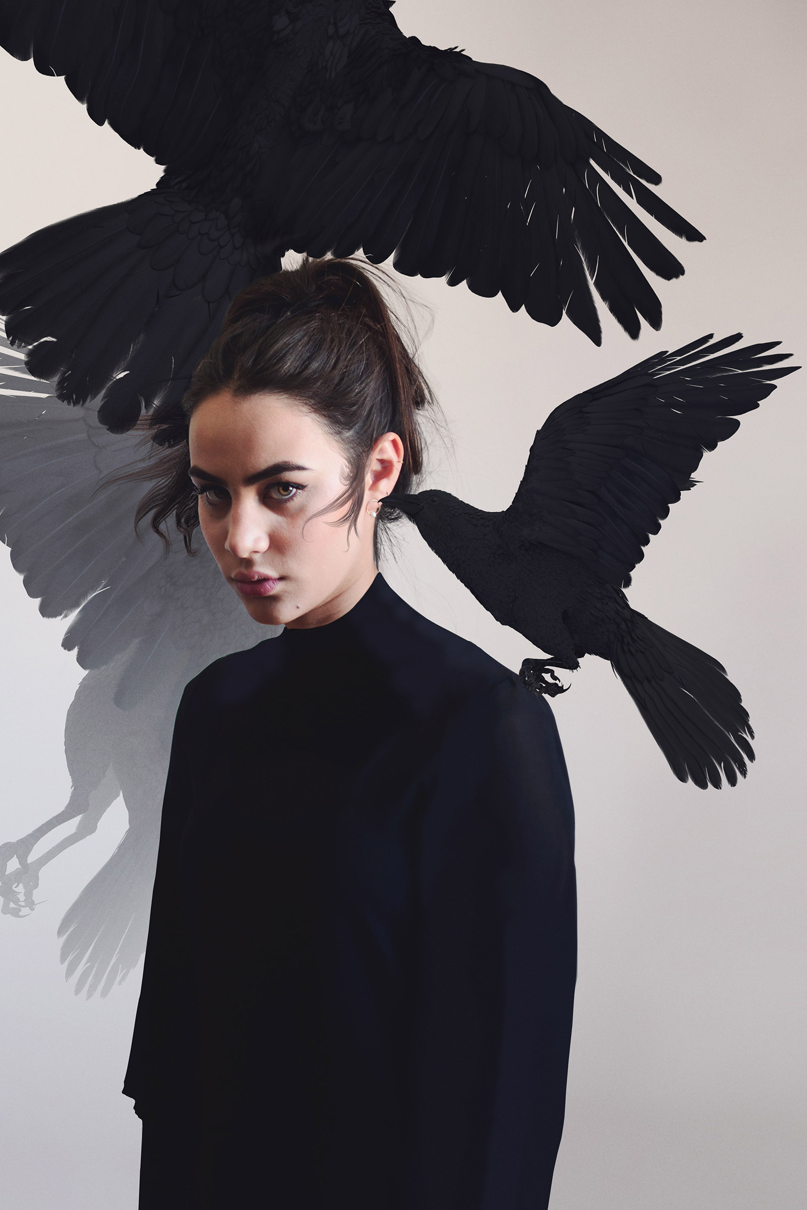 Valeria Cisneros portrays a mysterious allure with birds in flight set against a muted background.
